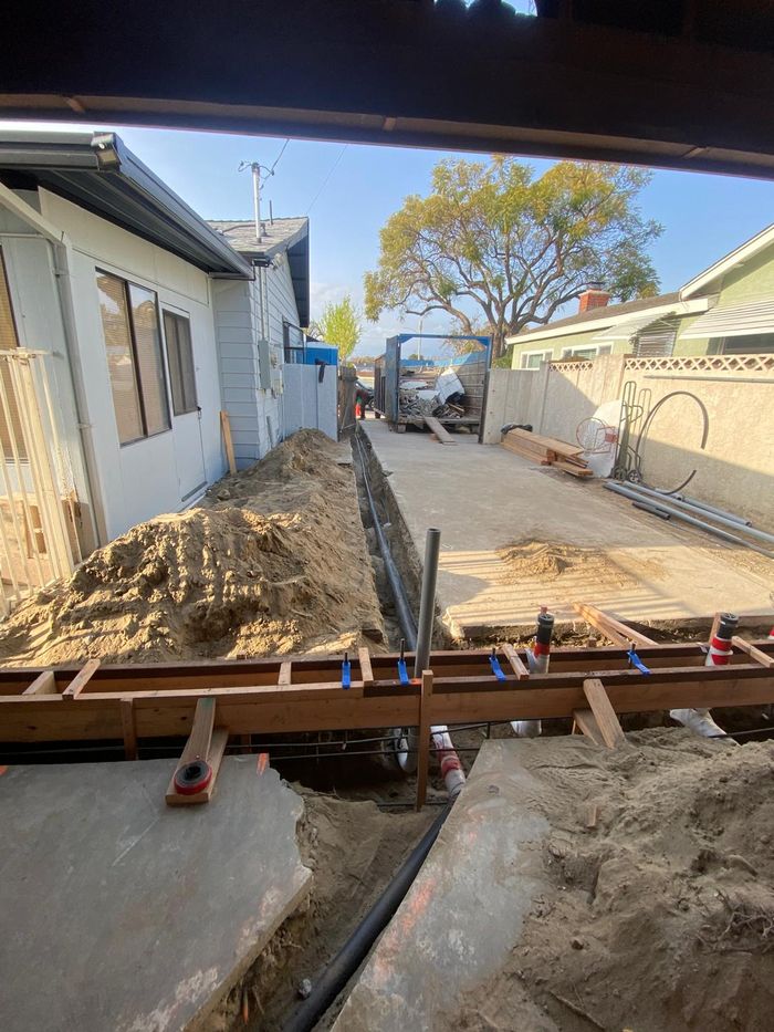 Underground plumbing rough-in inspected before the pour